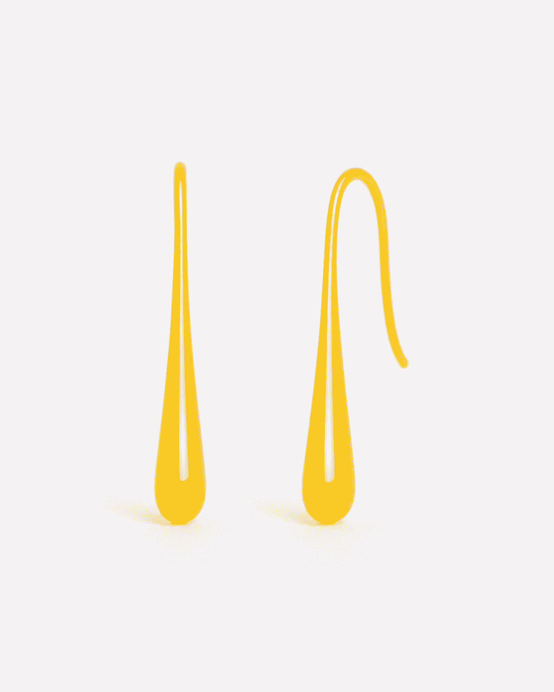 The Sunny Lemon Mini Huggies — Gold Plated Sunbeam Drop Huggie Earrings by House of Zena, worn on model