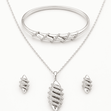 The "Rich Auntie" 3-Piece Power Set — Silver-Tone Wave 3-Piece Jewellery Set by House of Zena, flat lay