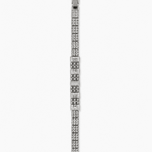The Milanese Woven Grid Chain — Silver-Tone Grid Bracelet by House of Zena, worn on model