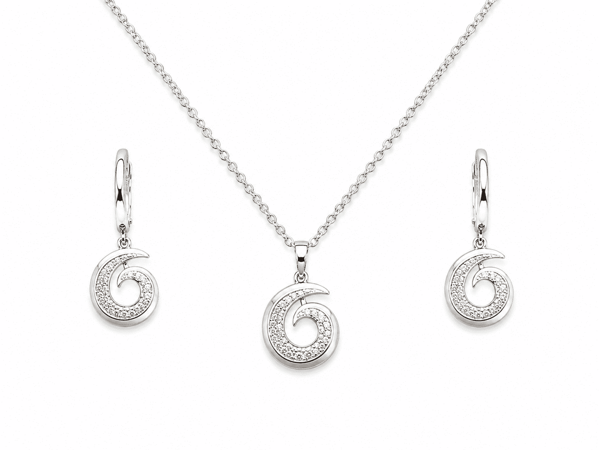 The Cinnamon Roll Spiral Set — Silver-Tone Spiral Pendant Set by House of Zena, flat lay