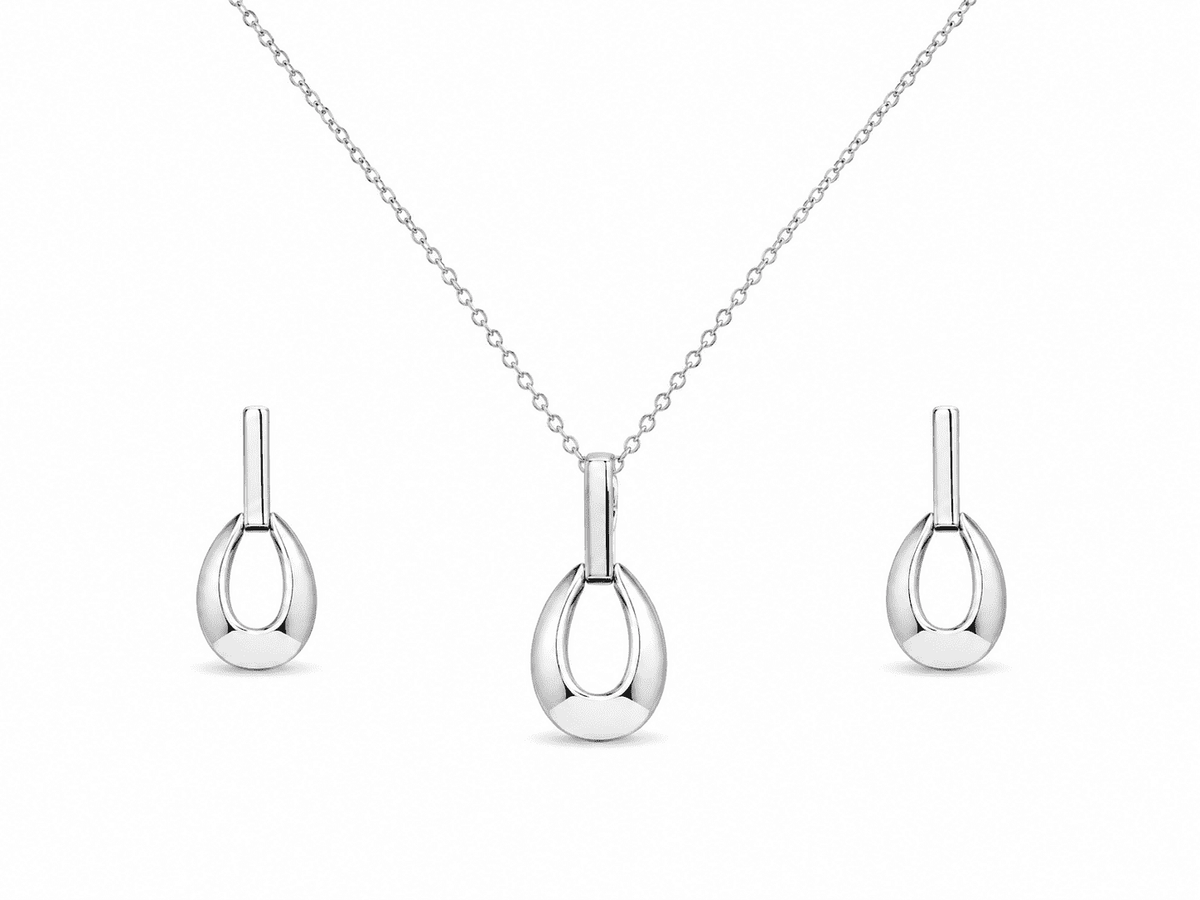 The Happy Tears Solitaire Set — Gold Plated Évara Drop Pendant Set by House of Zena, flat lay