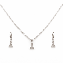 The Art Deco Geometric Set — Silver-Tone Triangle Pendant Set by House of Zena, flat lay