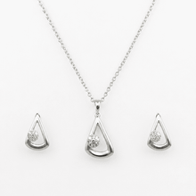 The "I Woke Up Like This" Set — Silver-Tone Drop Pendant Set by House of Zena, flat lay