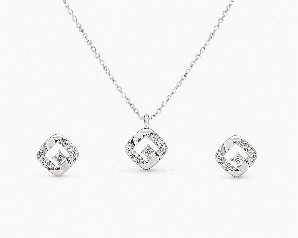 The Sugar Cube Solitaire Set — Gold Plated Square Pendant Set by House of Zena, flat lay