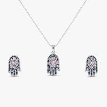 The "Good Karma Only" Hamsa Set — Silver-Tone Hamsa Pendant Set by House of Zena, flat lay