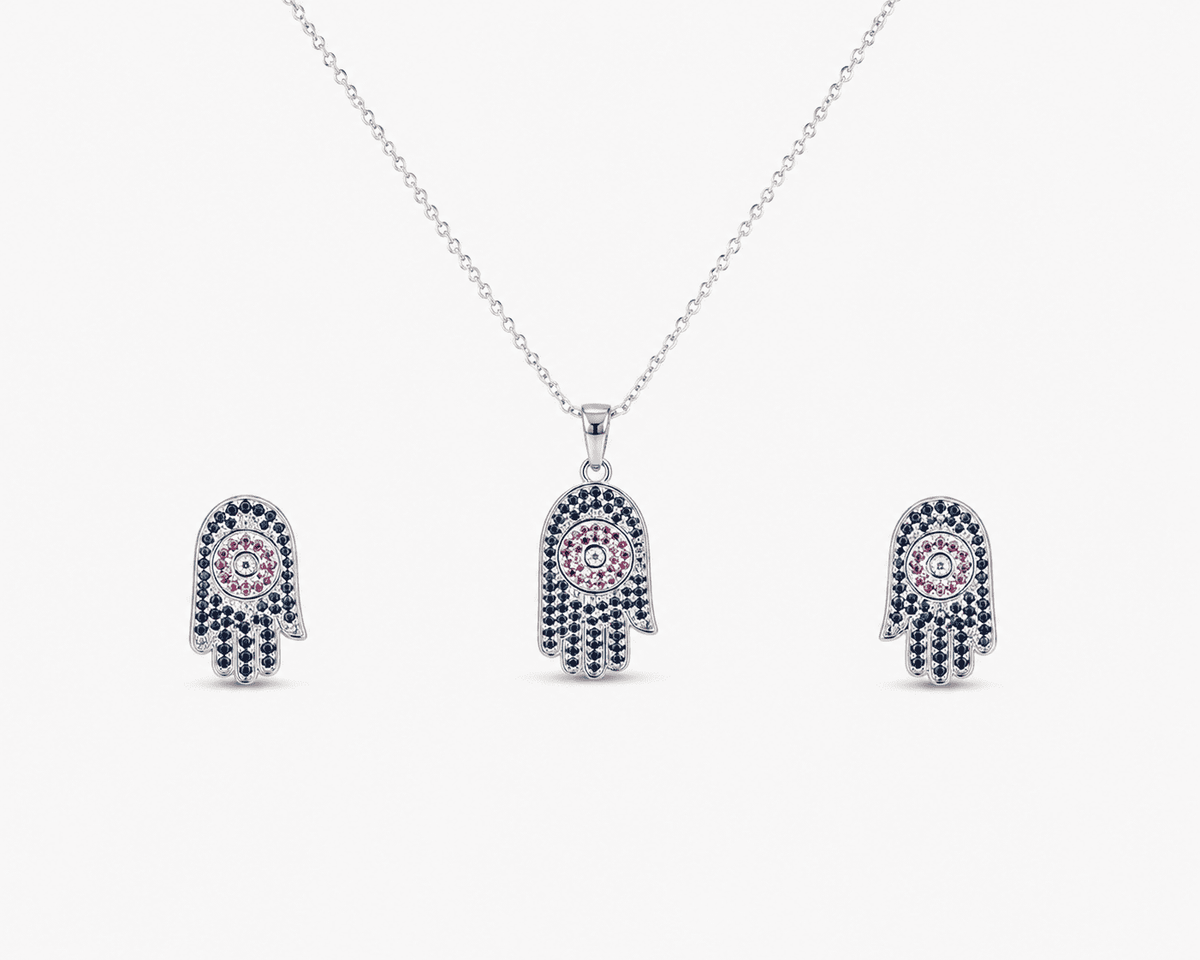 The "Good Karma Only" Hamsa Set — Silver-Tone Hamsa Pendant Set by House of Zena, flat lay