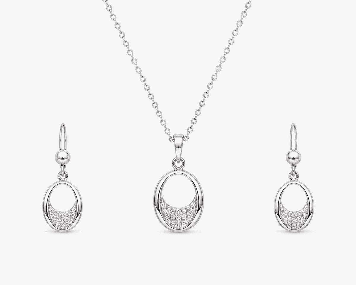 The Almond Truffle Solitaire Set — Silver-Tone Oval Pendant Set by House of Zena, flat lay