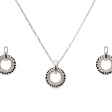 The Black Truffle Midnight Set — Silver-Tone Halo Pendant Set by House of Zena, flat lay