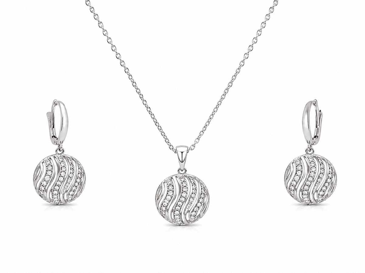 The Golden Hour Ripple Set — Silver-Tone Wave Pendant Set by House of Zena, flat lay