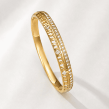The Golden Highway Pavé Bangle — Gold Plated Golden Linea Bangle by House of Zena, flat lay