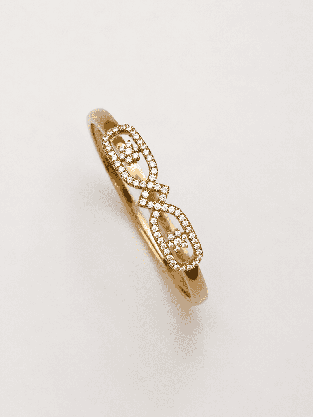 The Lucky Four-Leaf Clover Bangle — Gold Plated Duo Clover Bangle by House of Zena, flat lay