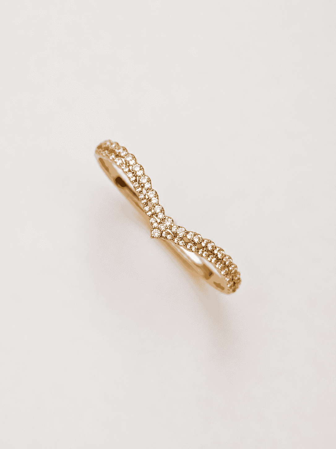 The French Cruller Twist Bangle — Gold Plated Infinity Twist Bangle by House of Zena, worn on model