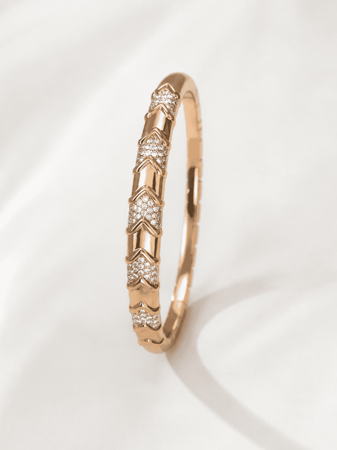 The Wishbone Chevron Bangle — Gold Plated Chevron Pavé Bangle by House of Zena, flat lay