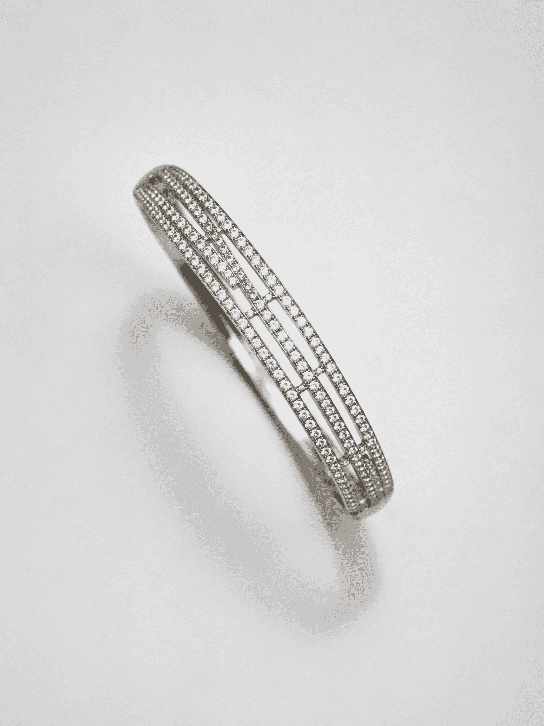 The Fast Track Triple Bangle — Gold Plated Linear Pavé Bangle by House of Zena, flat lay