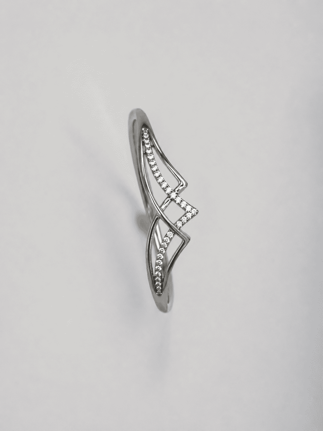 The Liquid Gold Contour Cuff — Silver-Tone Curve Bangle by House of Zena, flat lay