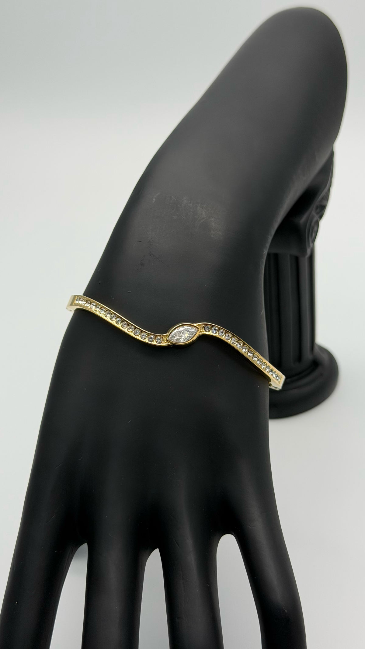 The "Liquid Asset" Sculpted Cuff Bracelet — Studio Packshot (Angle 1)