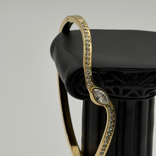The "Liquid Asset" Sculpted Cuff Bracelet — Studio Packshot (Angle 3)