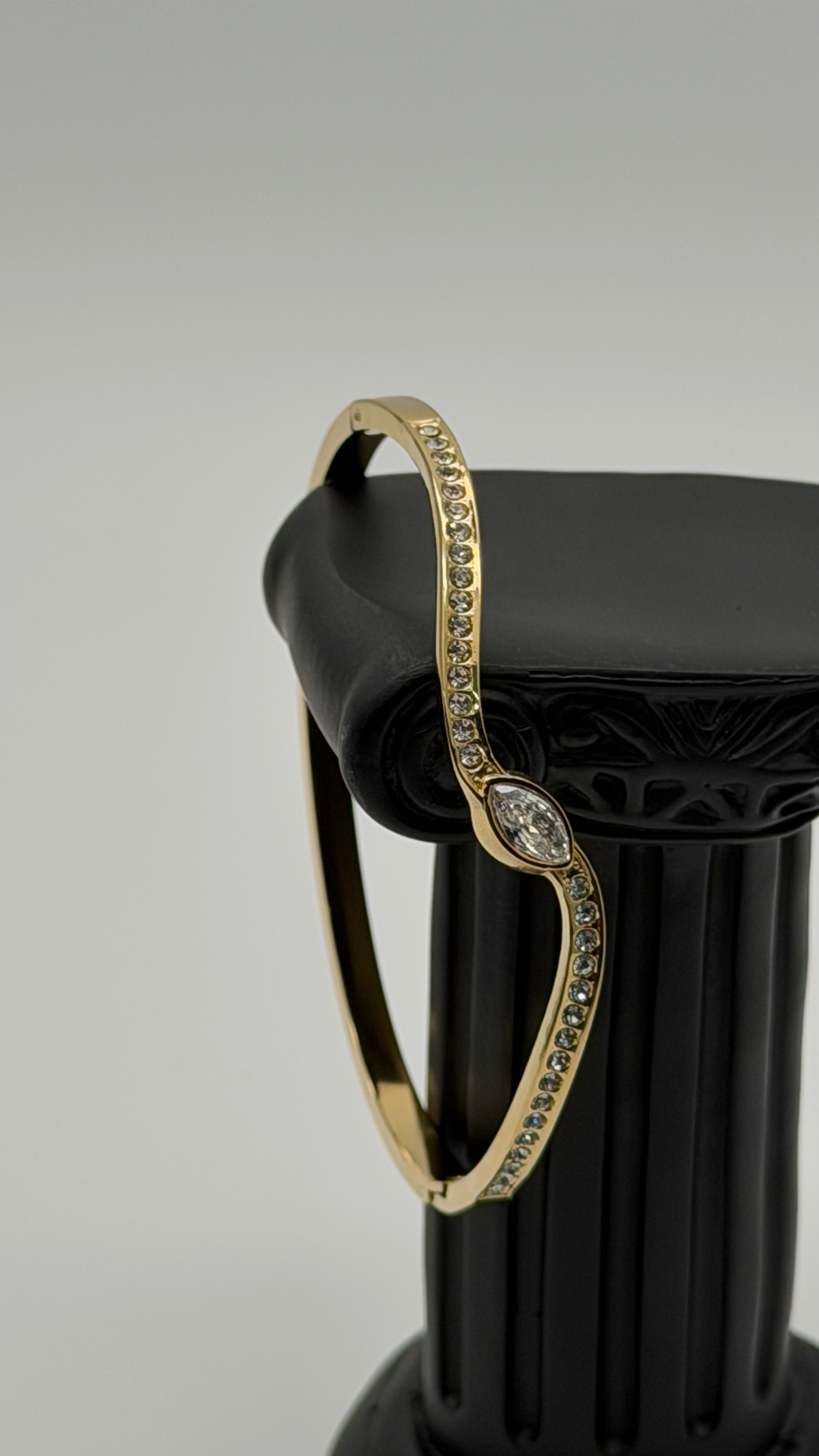 The "Liquid Asset" Sculpted Cuff Bracelet — Studio Packshot (Angle 3)