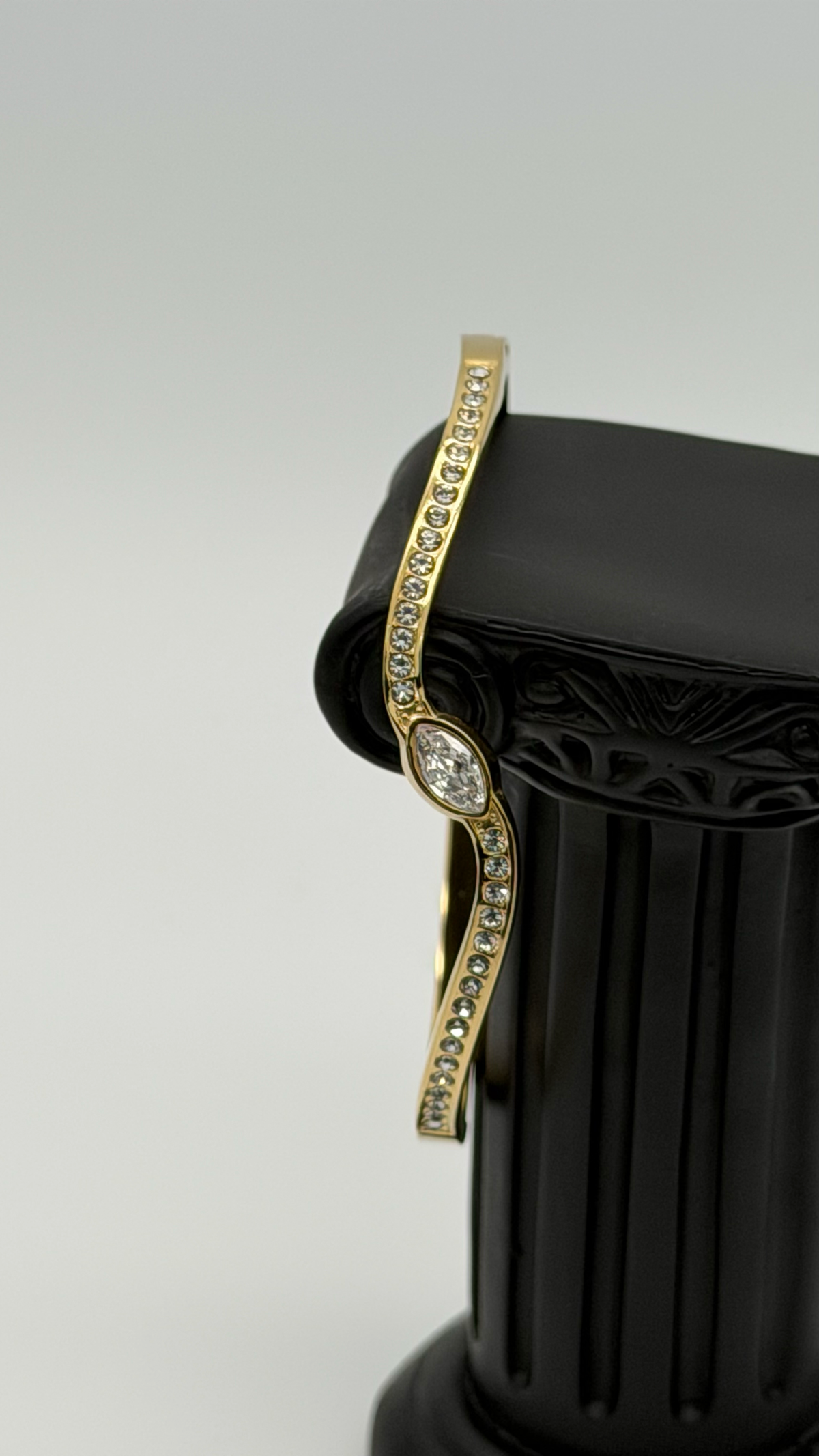 The "Liquid Asset" Sculpted Cuff Bracelet — Studio Packshot (Angle 4)