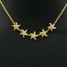 The "Heart on My Sleeve" Sculpted Pendant Necklace — Studio Packshot (Angle 2)